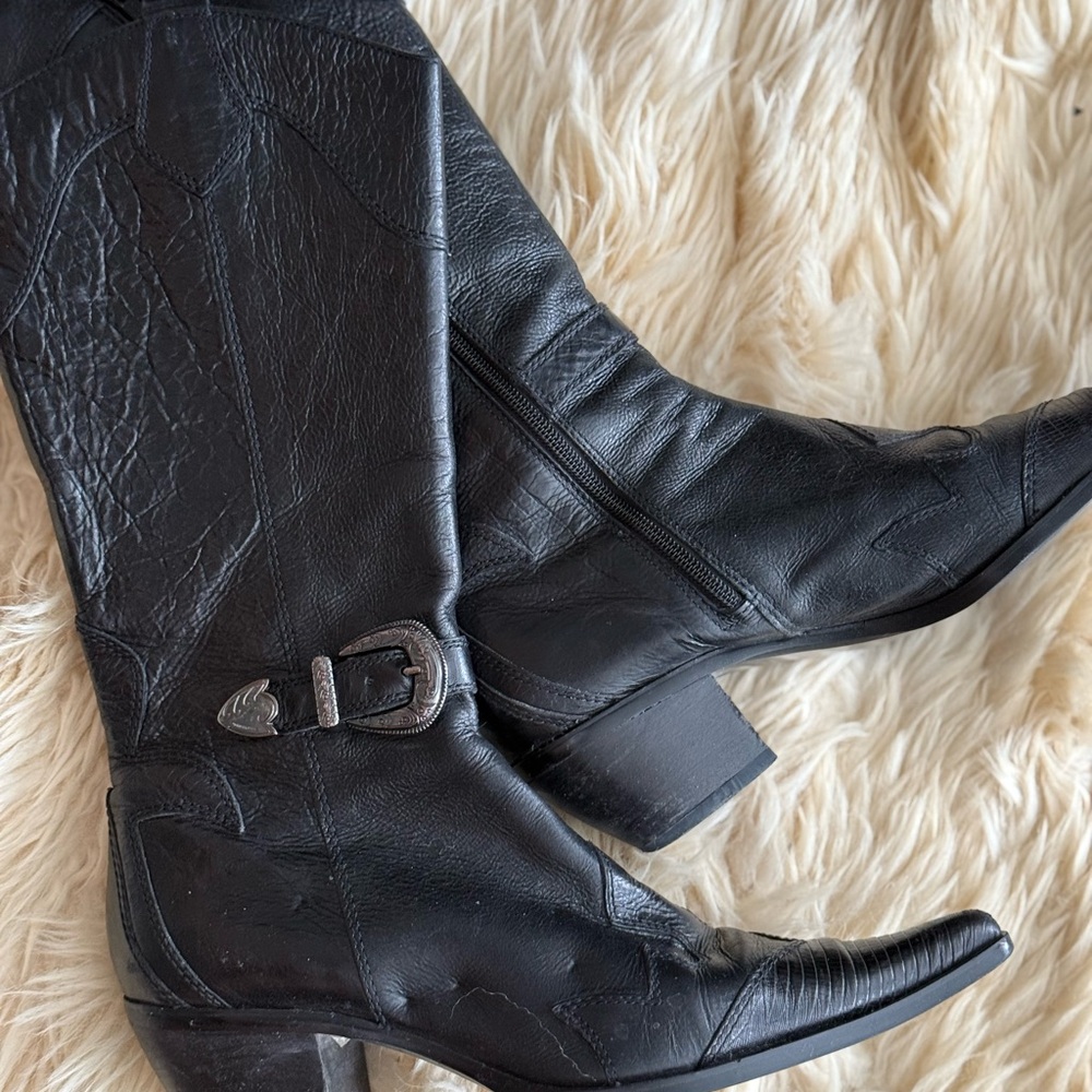 Steve Madden; Black point-toe distress leather boots.